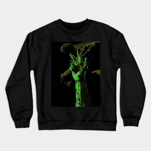 Digital collage and special processing. Hand near clouds. Holy trinity hand gesture. Very strange, green. Bizarre. Zombie. Crewneck Sweatshirt